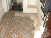 murray-victorian-tiling-contract-glasgow-showing-area-of-lifted-tiles-stairside